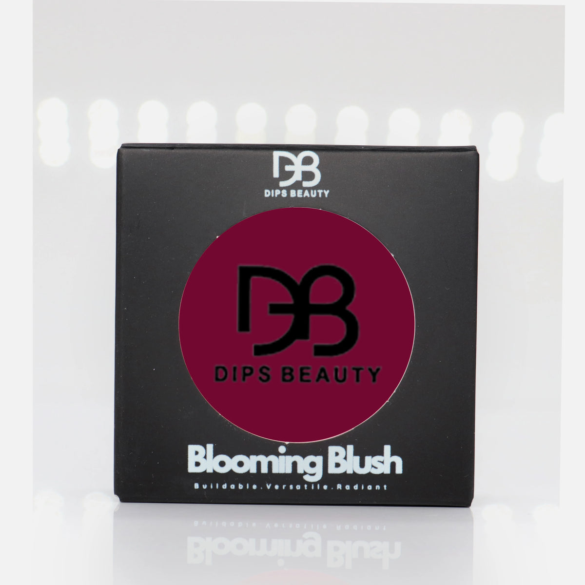 DIPS BEAUTY Berry Blooming Blush in a soft berry shade, shown on models with a radiant satin finish.