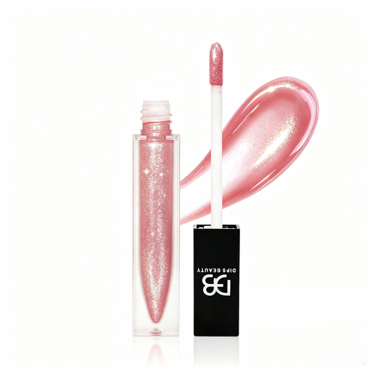 DIPS BEAUTY Goal Digger soft pink shimmer lip gloss with a glossy finish
